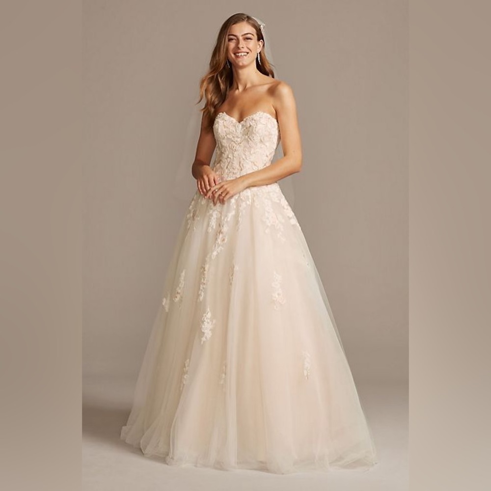 Beautiful embroidered lace wedding ballgown